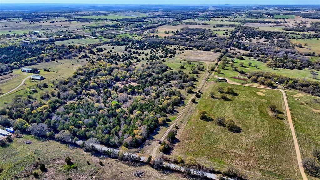 Tbd Cole Road Bowie, TX 76230 - Photo 22 of 27 an aerial view of residential house with outdoor space