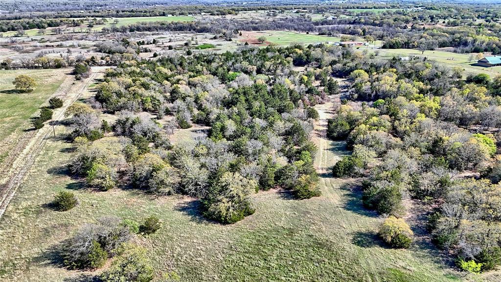 Tbd Cole Road Bowie, TX 76230 - Photo 23 of 27 an aerial view of a house with a yard