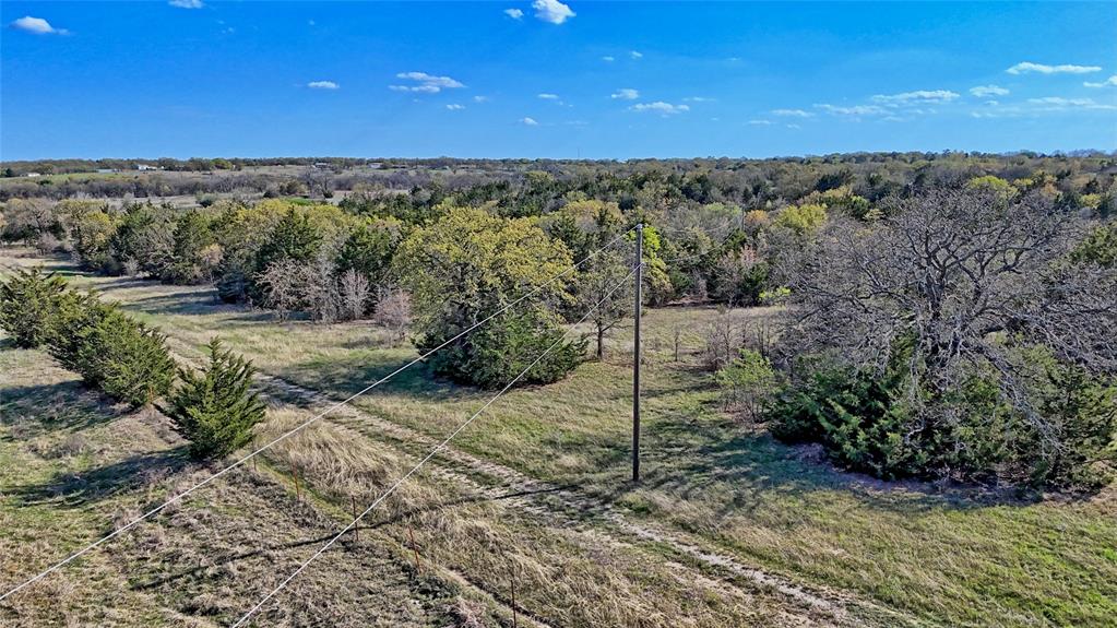 Tbd Cole Road Bowie, TX 76230 - Photo 4 of 27 a view of a road from a yard