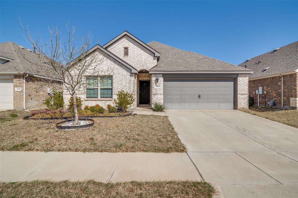 4204 Bullock Lane Forney, TX 75126 - Photo 1 of 25 a front view of a house with porch