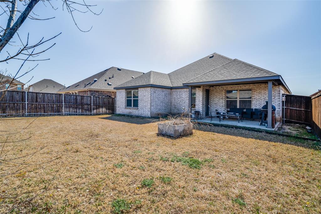 4204 Bullock Lane Forney, TX 75126 - Photo 25 of 25 a view of a house with a yard