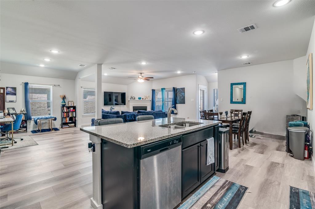 4204 Bullock Lane Forney, TX 75126 - Photo 9 of 25 a kitchen with counter space and center island