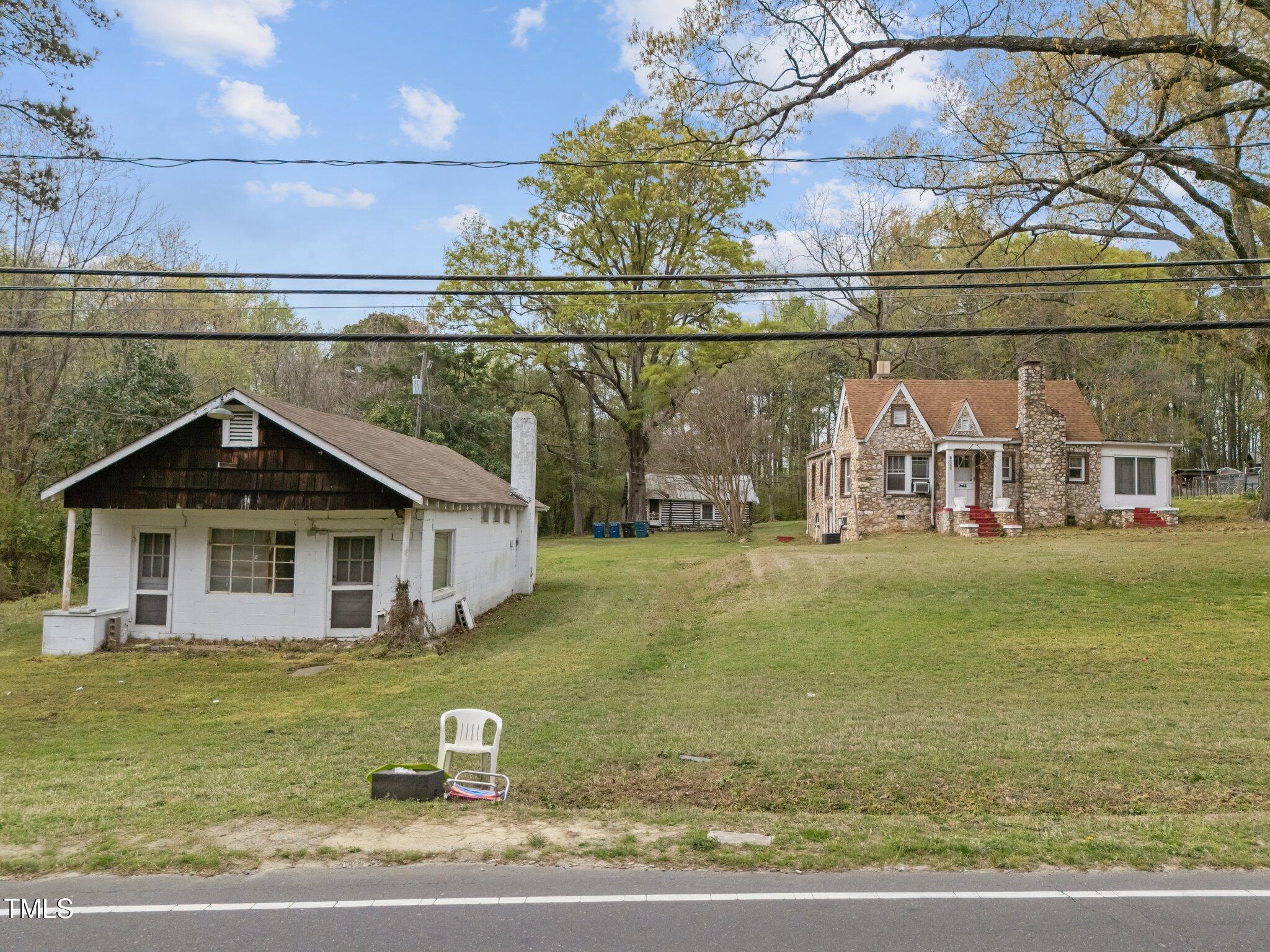 1823 East Geer Street Durham, NC 27704 - Photo 10 of 55 a front view of a house with a yard