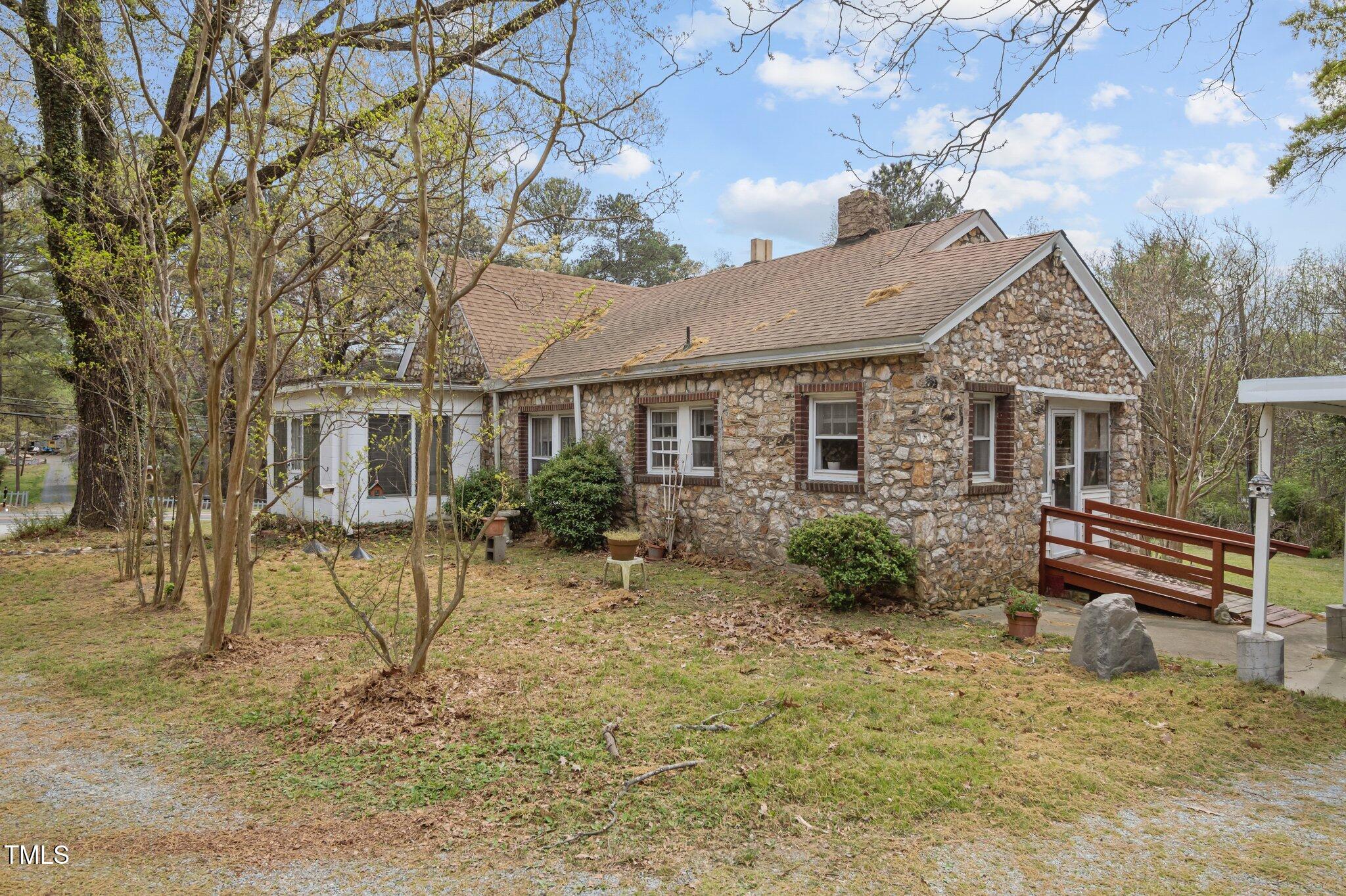 1823 East Geer Street Durham, NC 27704 - Photo 16 of 55 a view of a house with a yard