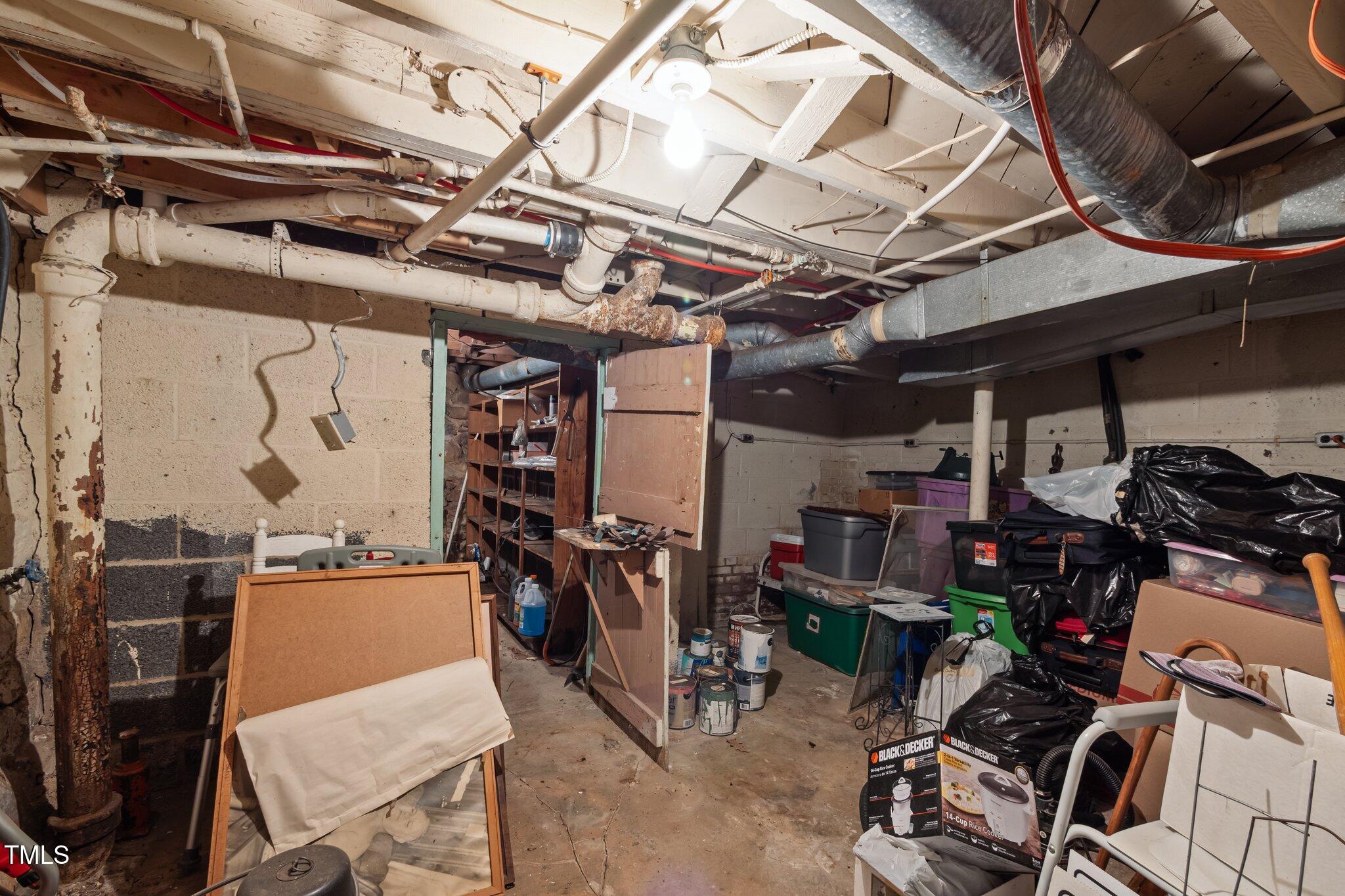 1823 East Geer Street Durham, NC 27704 - Photo 41 of 55 a view of a storage room with a lot of stuff