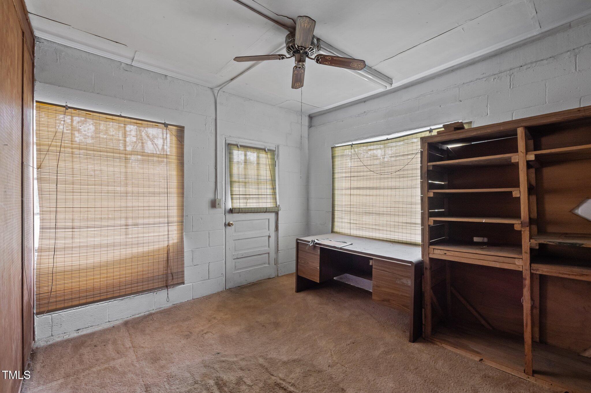 1823 East Geer Street Durham, NC 27704 - Photo 53 of 55 a view of room with walk in closet and window