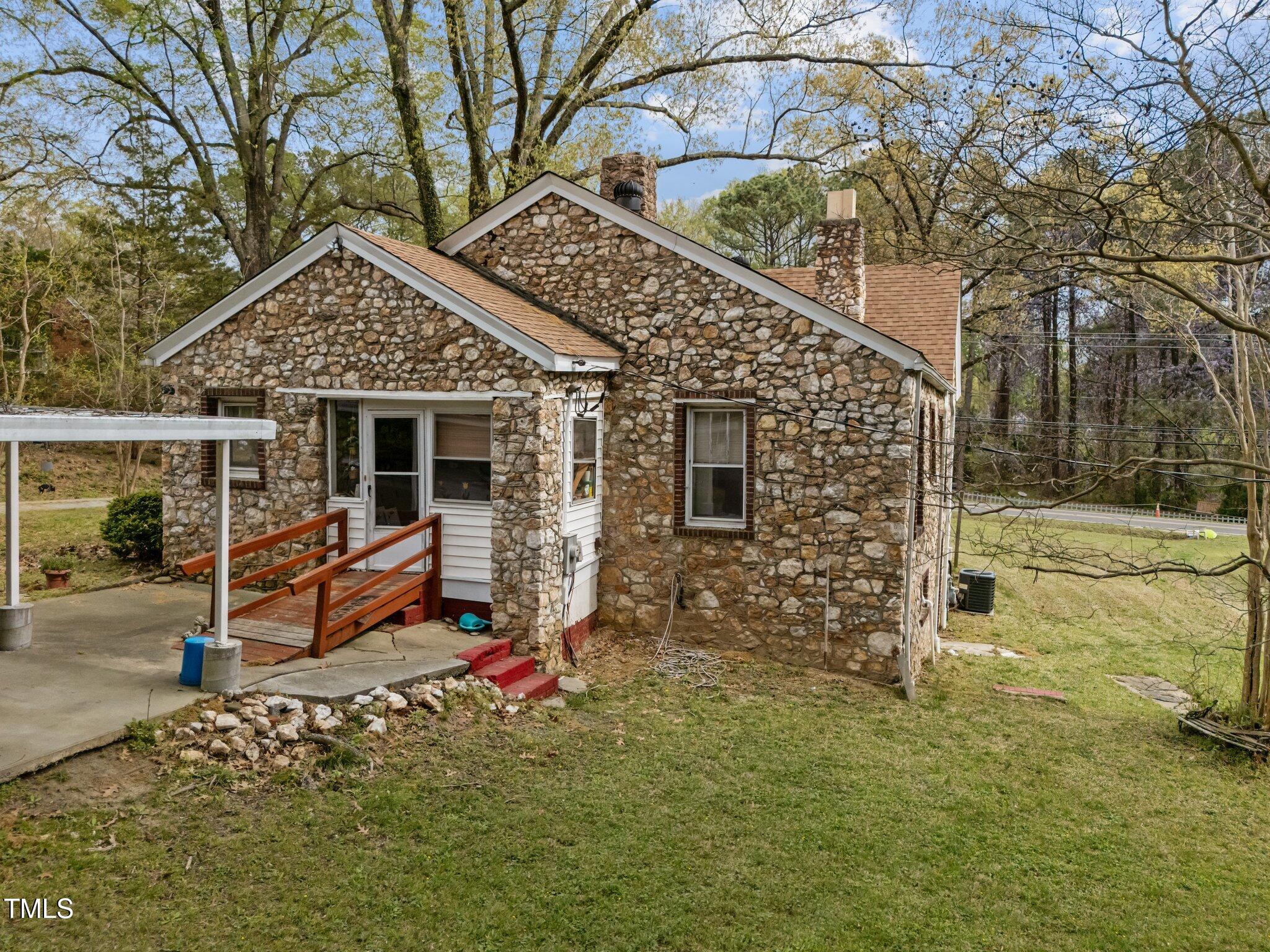 1823 East Geer Street Durham, NC 27704 - Photo 7 of 55 a view of a house with a yard