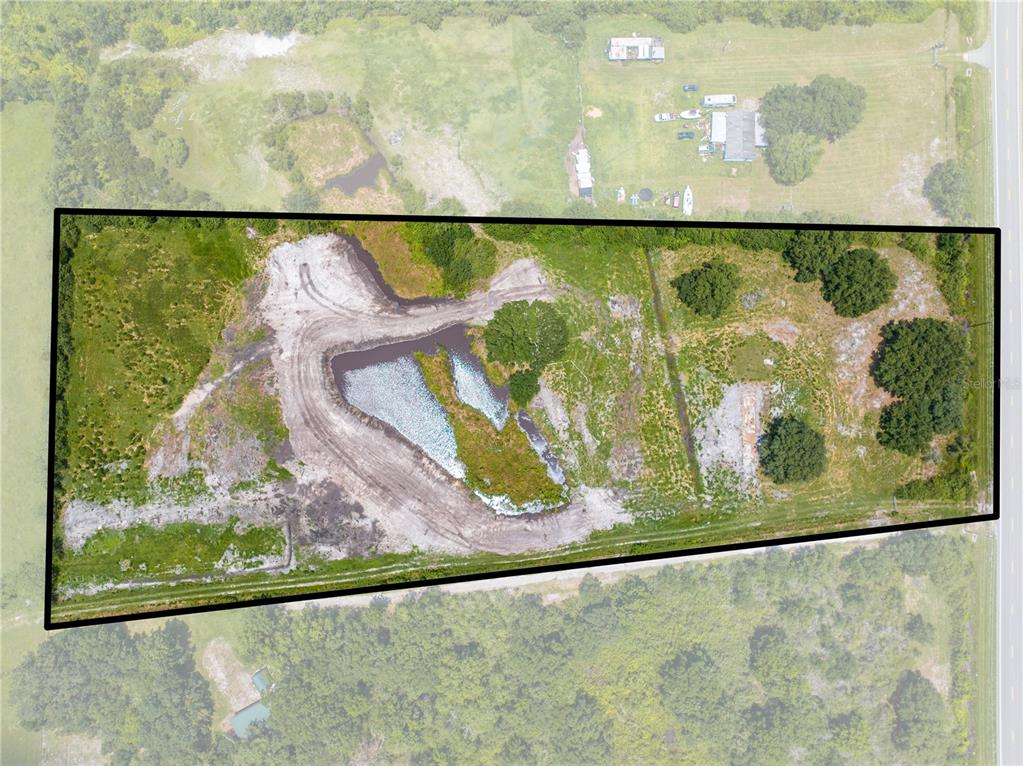 5420 Holopaw Road St. Cloud, FL 34773 - Photo 6 of 16 a view of a painting on a tree