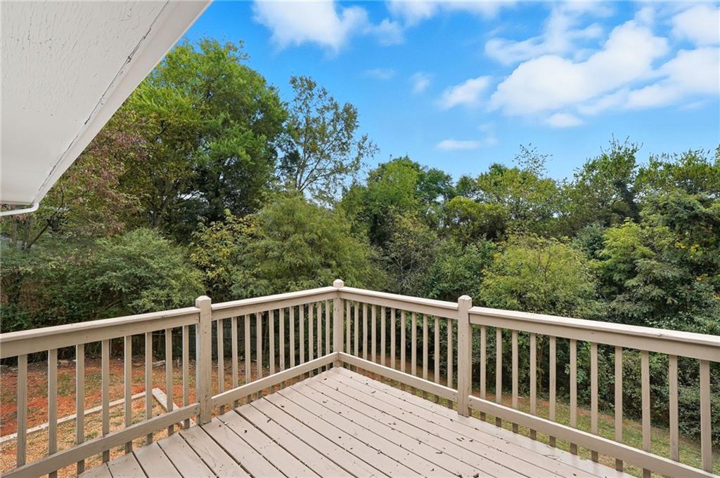 9 Chestnut Street Cartersville, GA 30120 - Photo 15 of 45 a balcony with wooden floor and fence
