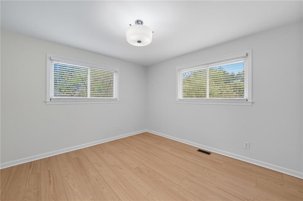 9 Chestnut Street Cartersville, GA 30120 - Photo 19 of 45 an empty room with a window