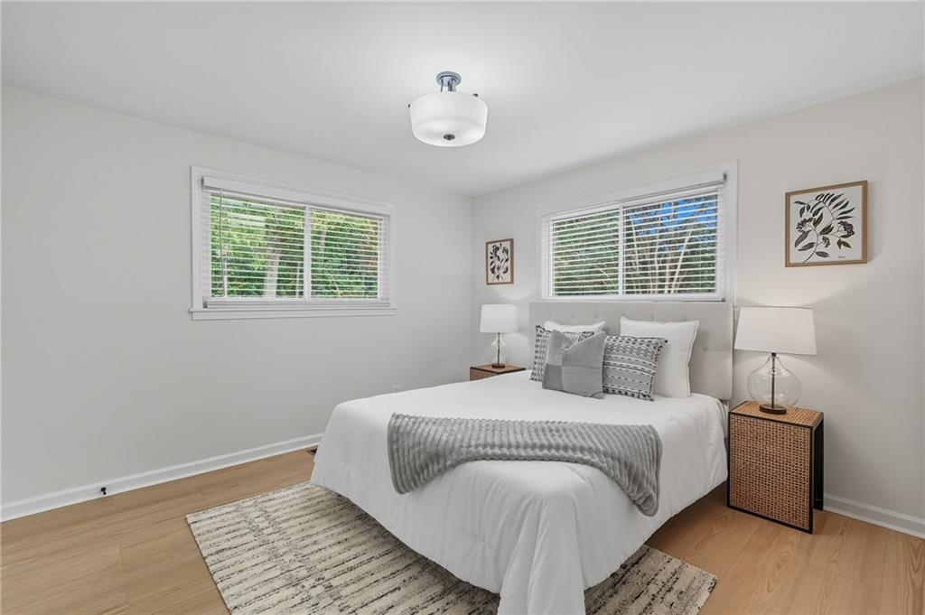 9 Chestnut Street Cartersville, GA 30120 - Photo 21 of 45 a bedroom with a large bed and a window