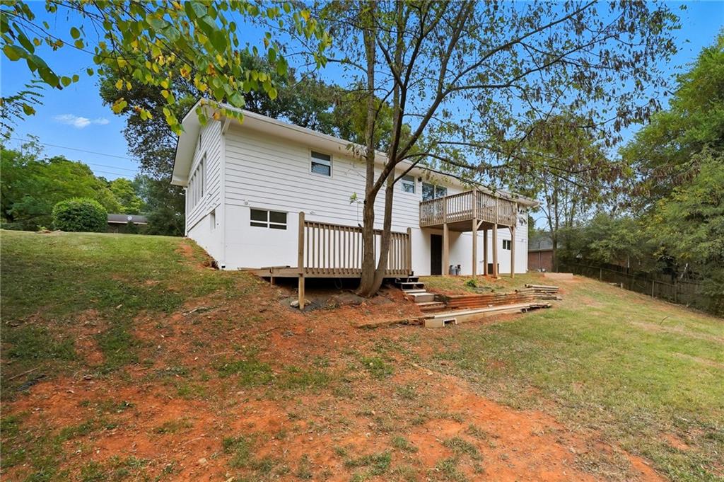9 Chestnut Street Cartersville, GA 30120 - Photo 33 of 45 a view of a house with backyard and tree