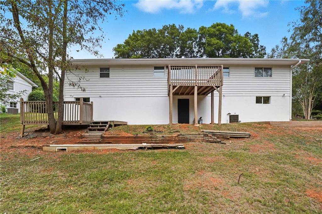 9 Chestnut Street Cartersville, GA 30120 - Photo 34 of 45 a view of a house with backyard and trees