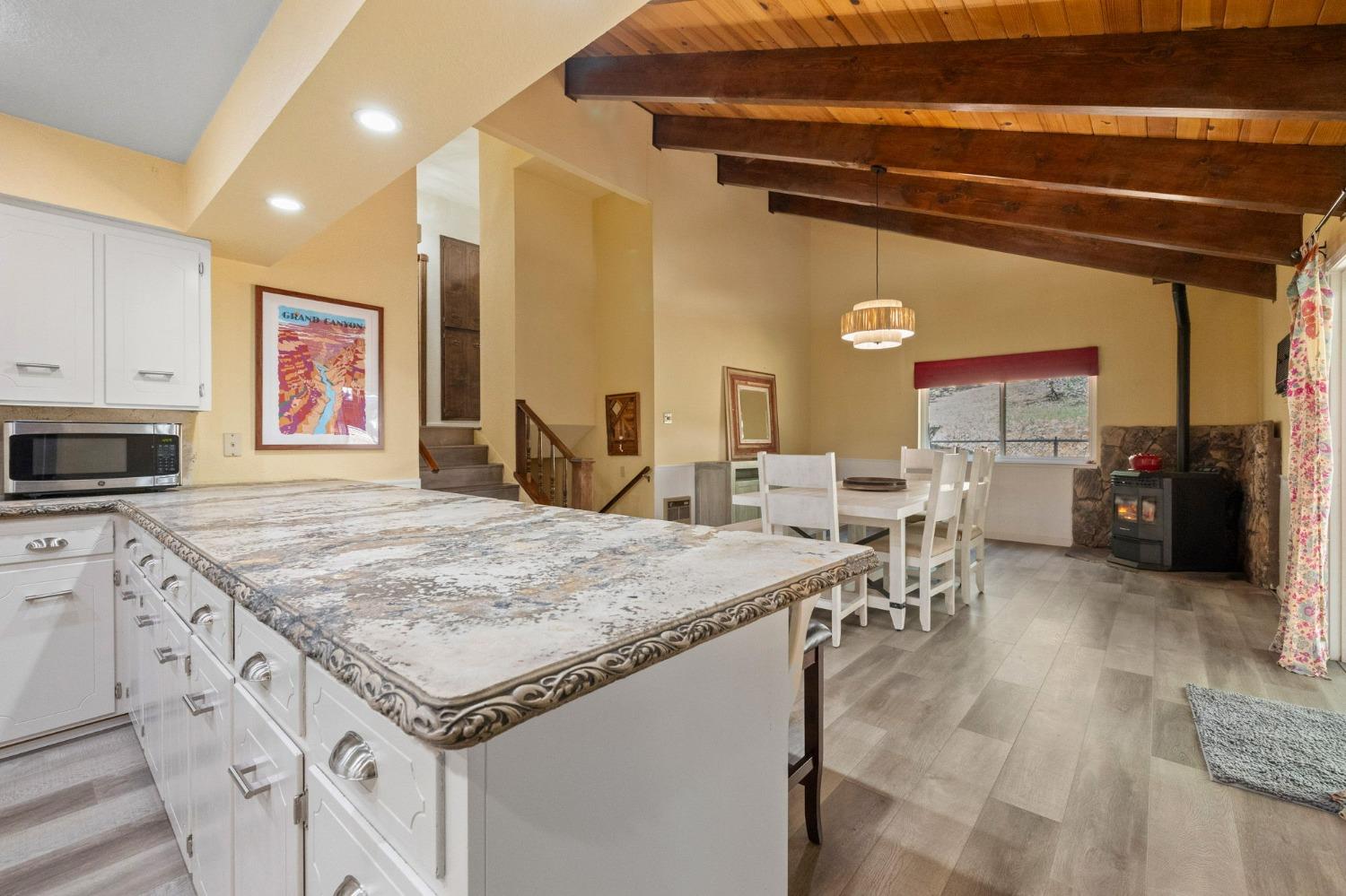 24014 Pine Cone Road Twain Harte, CA 95383 - Photo 13 of 43 a open kitchen with sink and cabinets