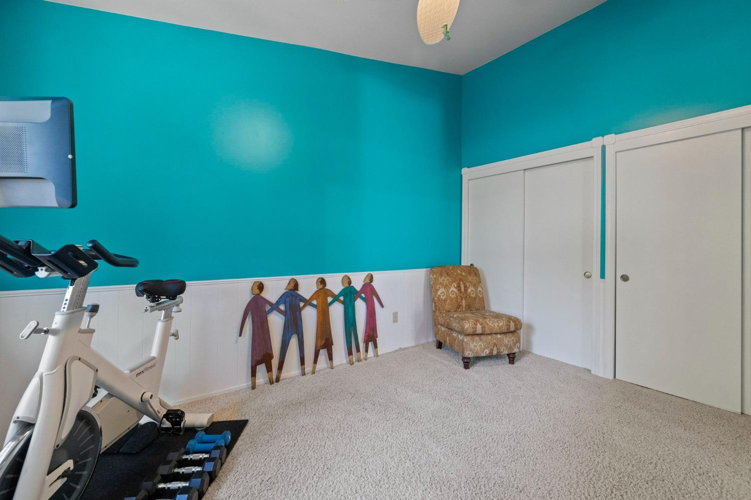 24014 Pine Cone Road Twain Harte, CA 95383 - Photo 19 of 43 a hallway with a bed and a couch