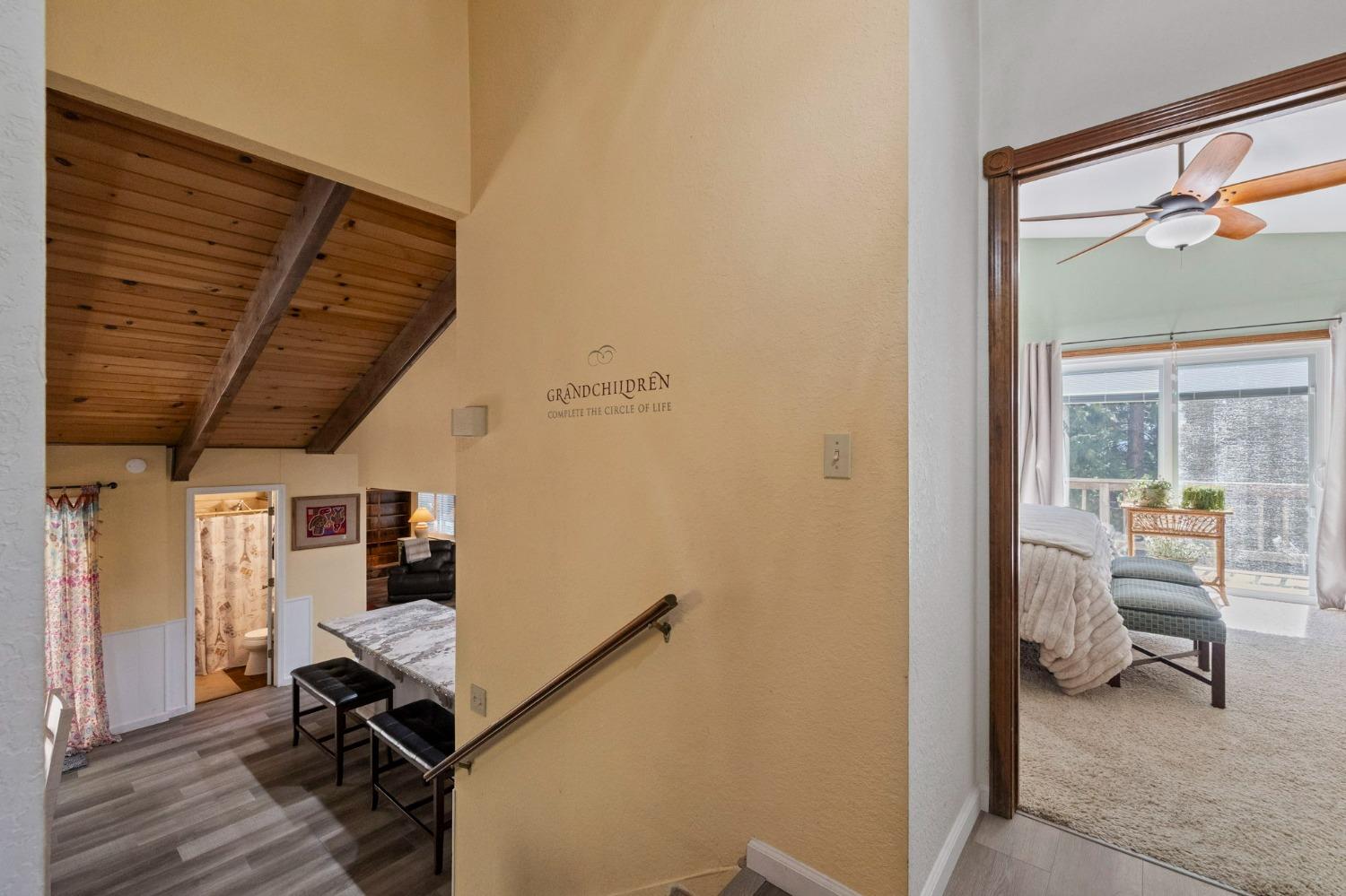 24014 Pine Cone Road Twain Harte, CA 95383 - Photo 21 of 43 a view of room with wooden floor and furniture