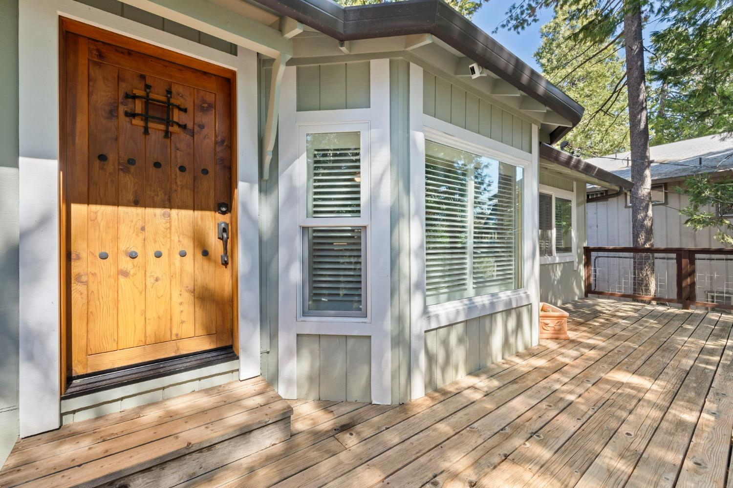 24014 Pine Cone Road Twain Harte, CA 95383 - Photo 25 of 43 a view of a house with a door and wooden floor