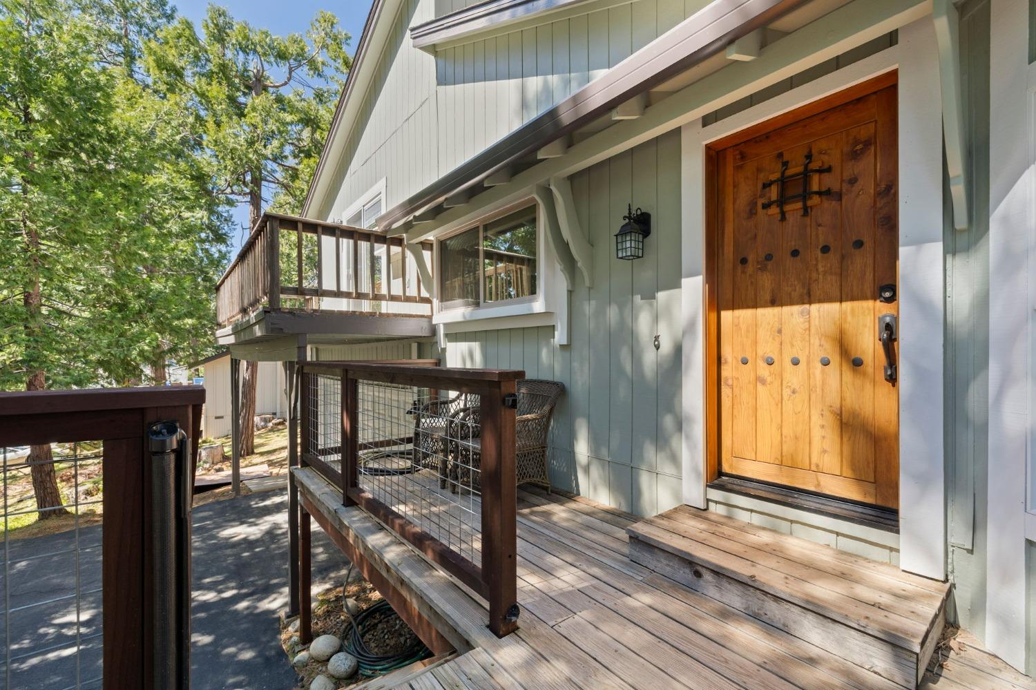 24014 Pine Cone Road Twain Harte, CA 95383 - Photo 27 of 43 a view of a house with wooden fence