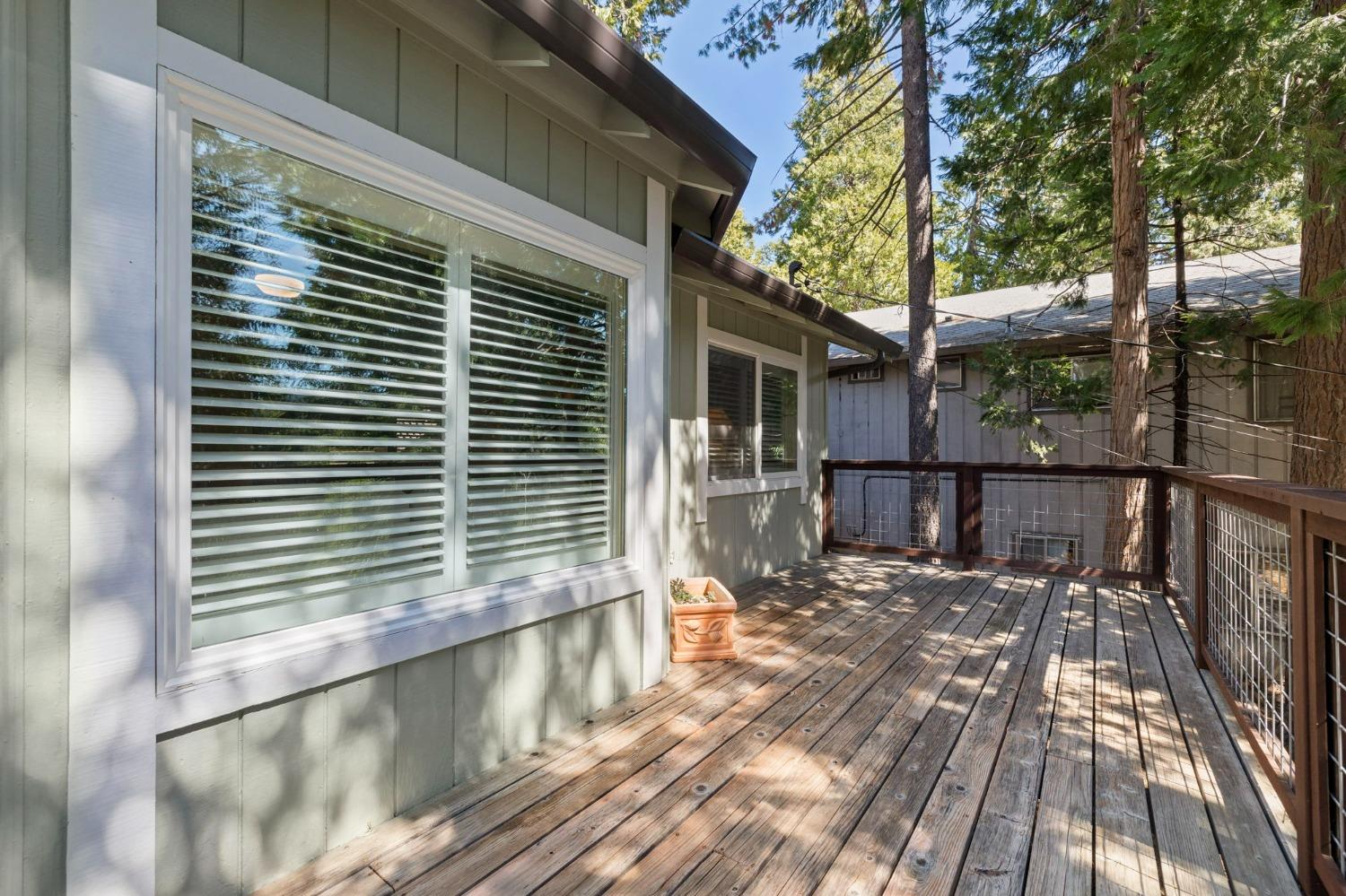 24014 Pine Cone Road Twain Harte, CA 95383 - Photo 32 of 43 a view of balcony with wooden floor and fence