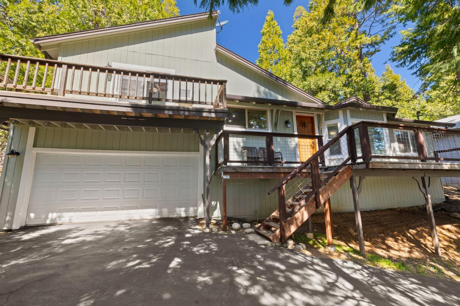 24014 Pine Cone Road Twain Harte, CA 95383 - Photo 39 of 43 a view of a house with a patio