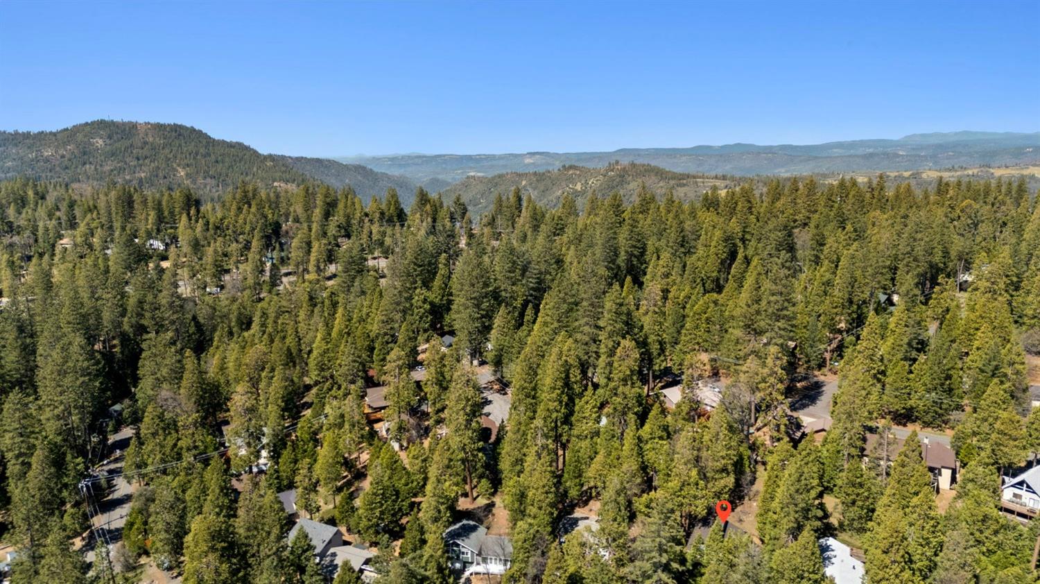 24014 Pine Cone Road Twain Harte, CA 95383 - Photo 43 of 43 a view of a city with mountains in the background