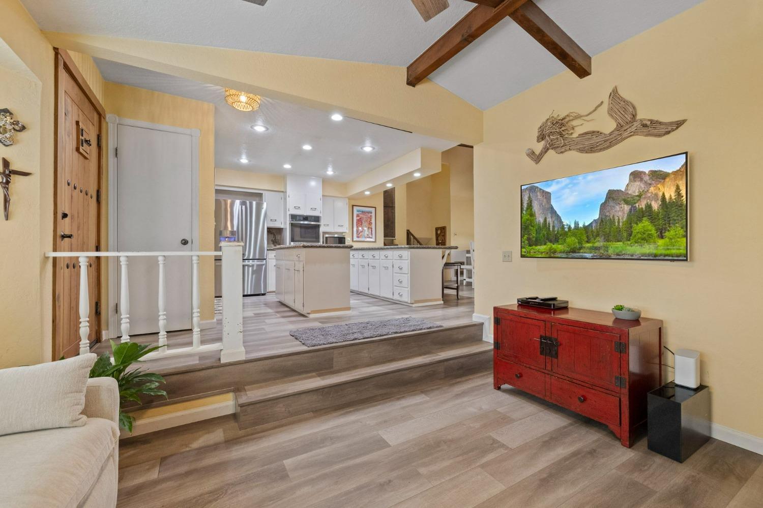 24014 Pine Cone Road Twain Harte, CA 95383 - Photo 10 of 43 a living room with furniture and a flat screen tv