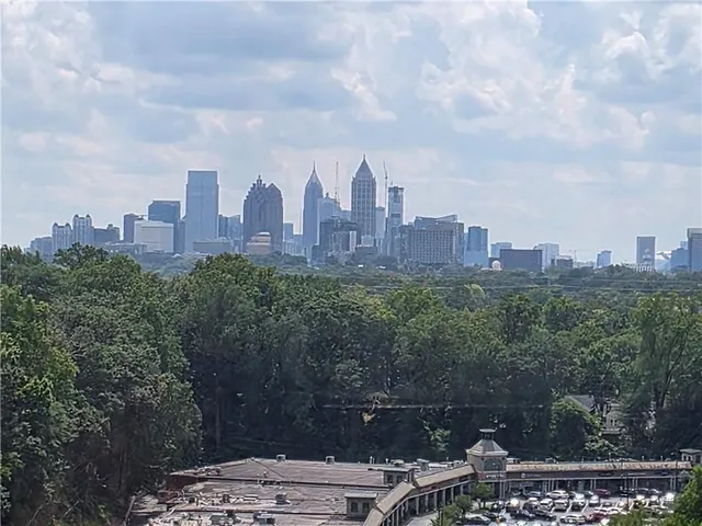 a view of a city with tall buildings