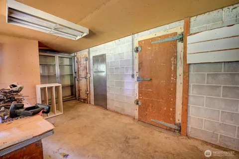 a bathroom with a shower and a sink