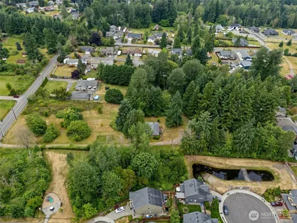 a view of a lake with a yard