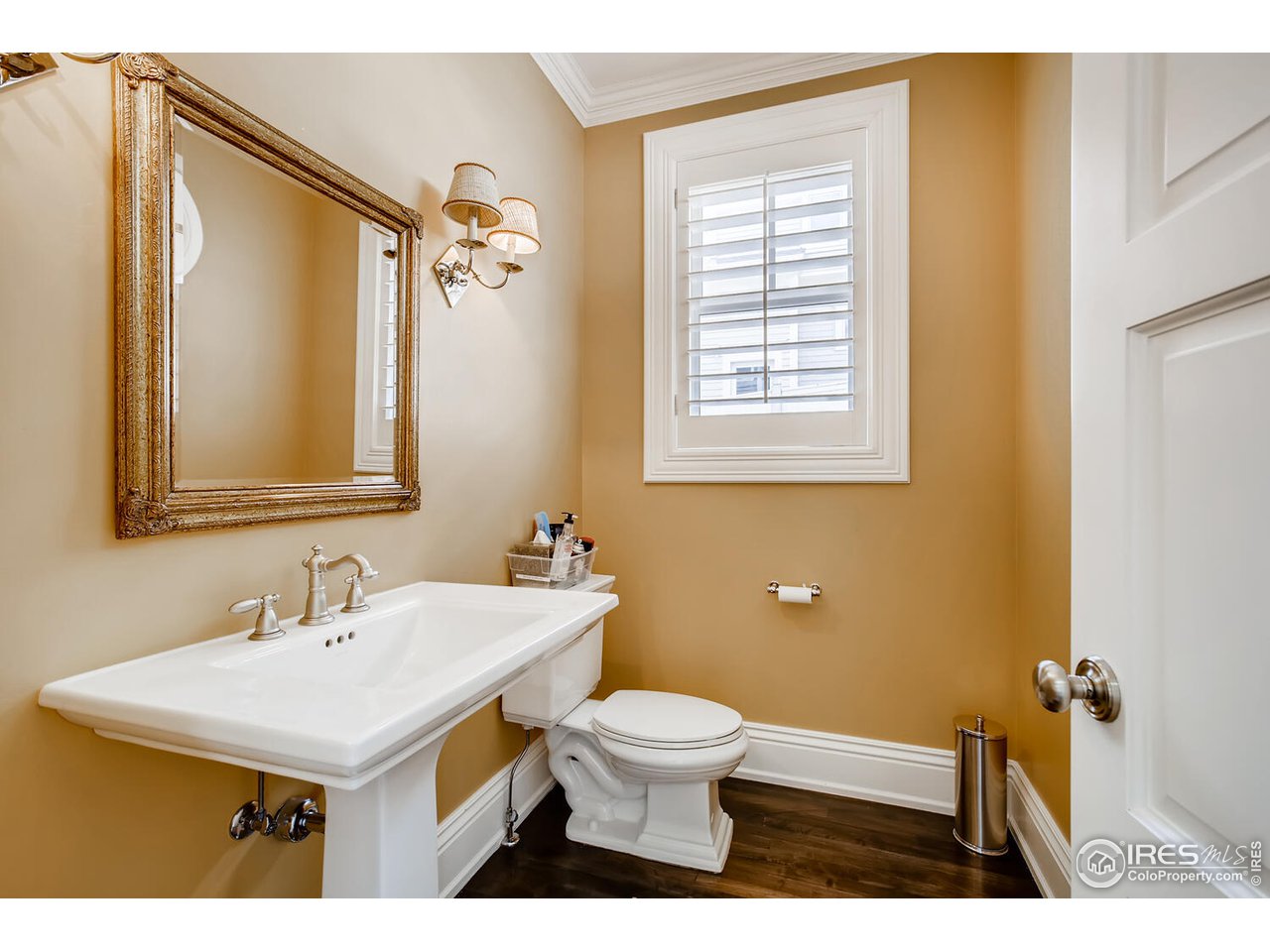 435 Valley View Drive Boulder, CO 80304 - Photo 13 of 40 a bathroom with a sink a toilet a mirror and a window