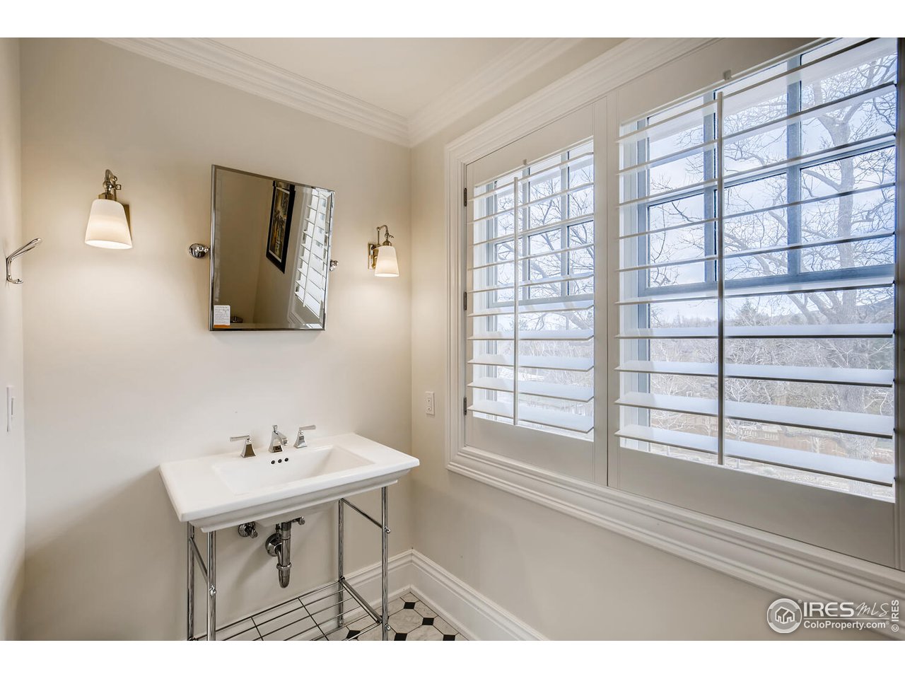 435 Valley View Drive Boulder, CO 80304 - Photo 23 of 40 a view of a bathroom with a sink and a window