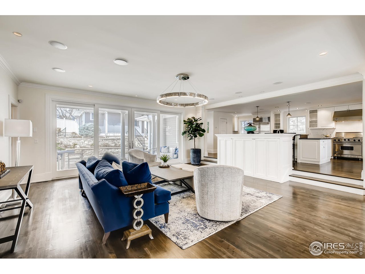 435 Valley View Drive Boulder, CO 80304 - Photo 4 of 40 a living room with furniture a large window and wooden floor