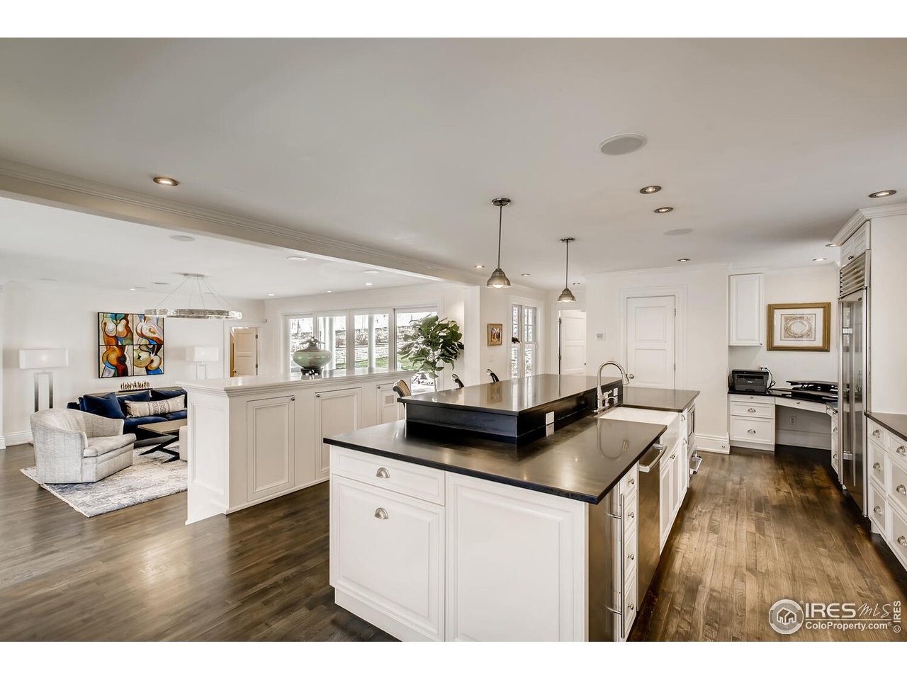 435 Valley View Drive Boulder, CO 80304 - Photo 7 of 40 a kitchen with stainless steel appliances granite countertop a stove and cabinets