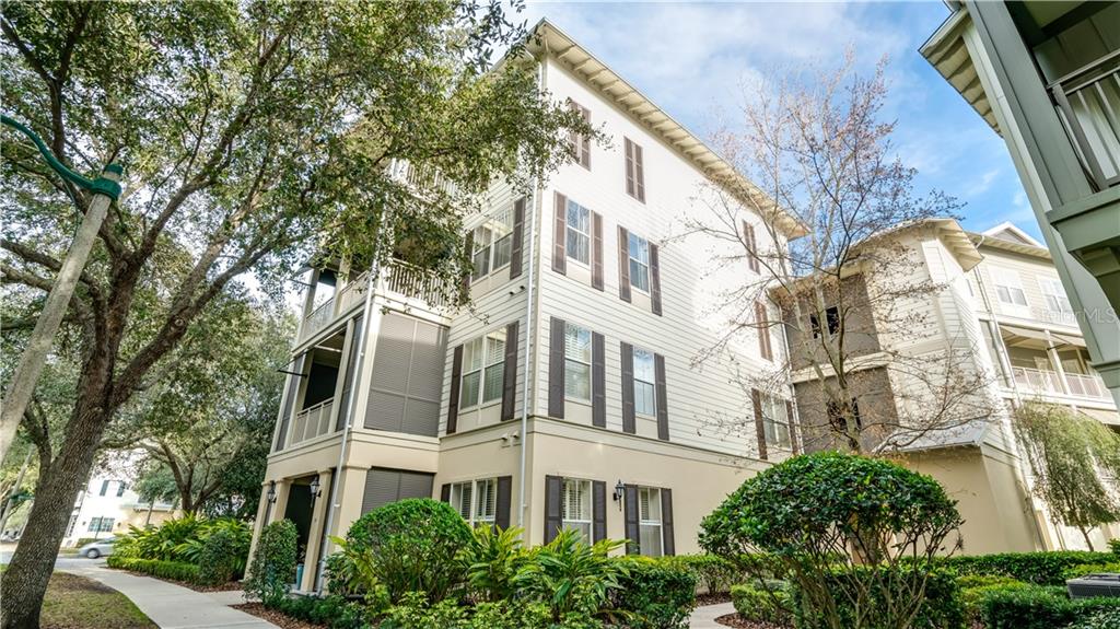 620 Campus Street, Unit 302 Celebration, FL 34747 - Photo 1 of 1 a view of a multi story building