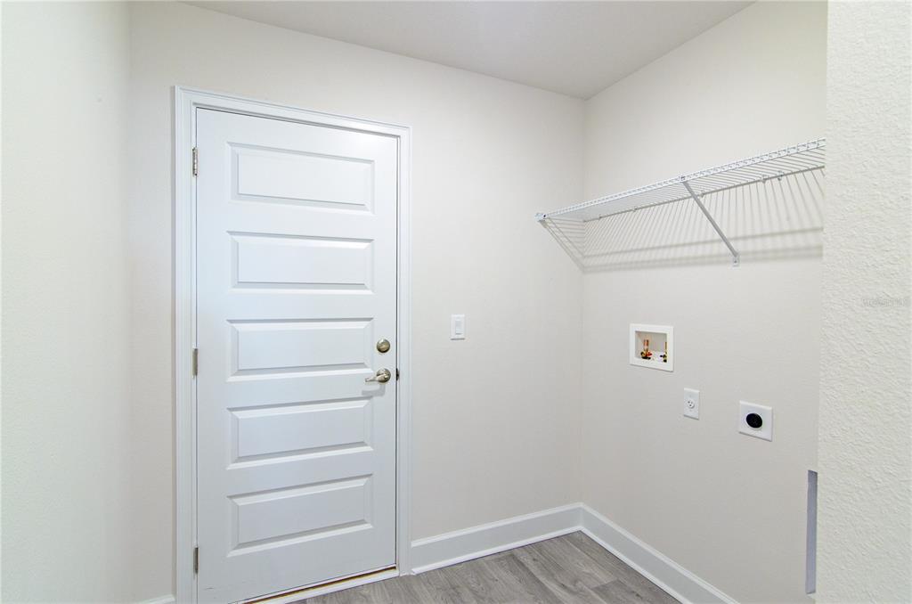 5 Red Clover Lane Palm Coast, FL 32164 - Photo 21 of 38 a view of an empty walk in closet