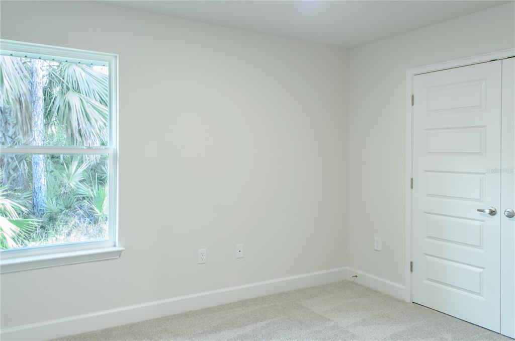 5 Red Clover Lane Palm Coast, FL 32164 - Photo 23 of 38 an empty room with a window