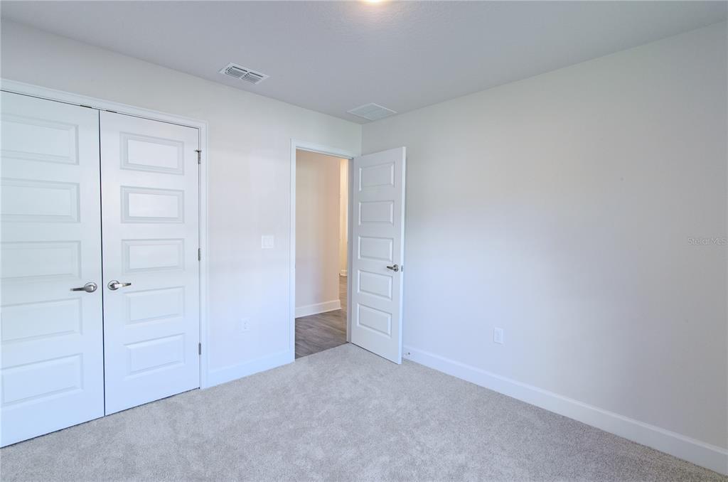 5 Red Clover Lane Palm Coast, FL 32164 - Photo 27 of 38 a view of an empty room