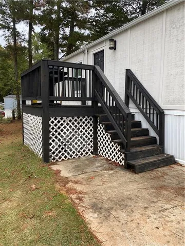 a view of a deck with a fence