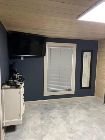 a view of empty room with front door