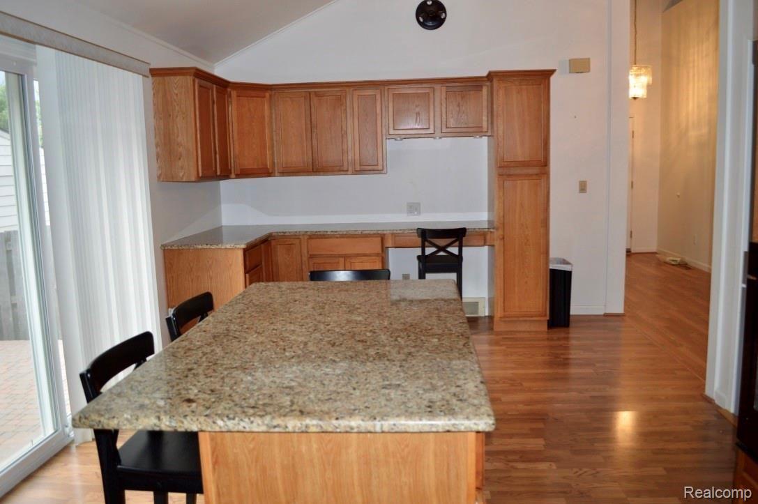 42415 Park Ridge Road Novi, MI 48375 - Photo 8 of 26 Tons of cabinent space in kitchen with access to huge outdoor brick patio