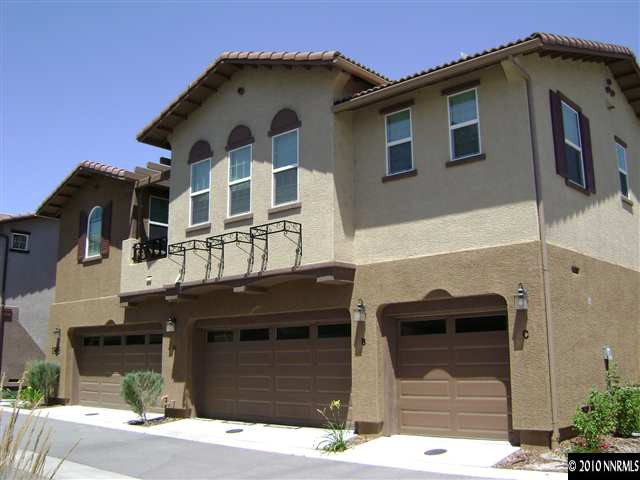 1845 A Wind Ranch Road Reno, NV 89521 - Photo 1 of 9 a front view of a house with parking