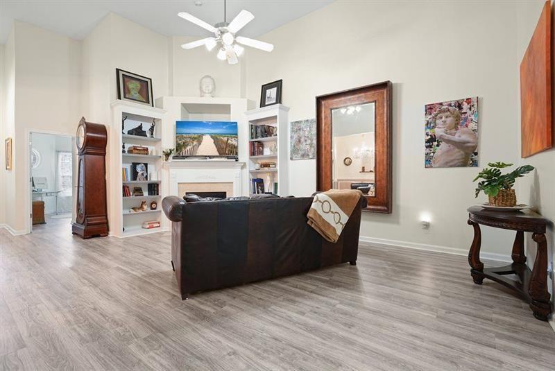 2521 Eden Ridge Lane, Unit 7 Acworth, GA 30101 - Photo 24 of 47 a living room with furniture and a flat screen tv