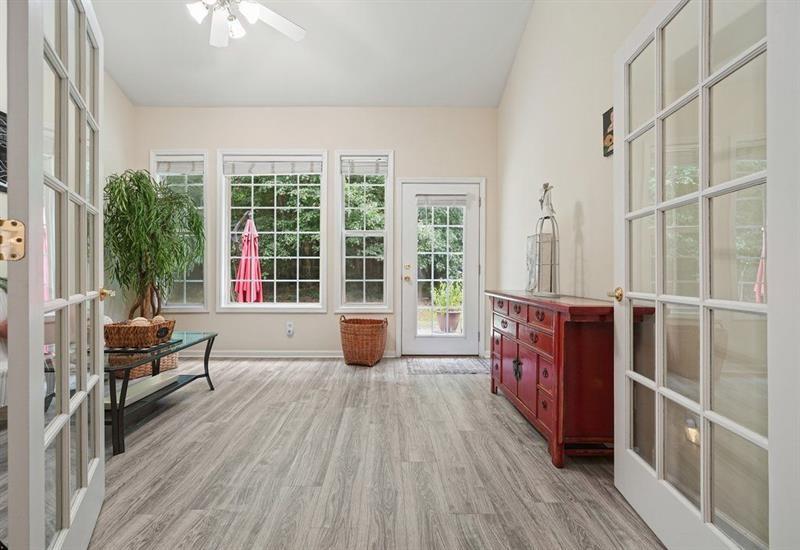 2521 Eden Ridge Lane, Unit 7 Acworth, GA 30101 - Photo 29 of 47 a view of living room with furniture and wooden floor