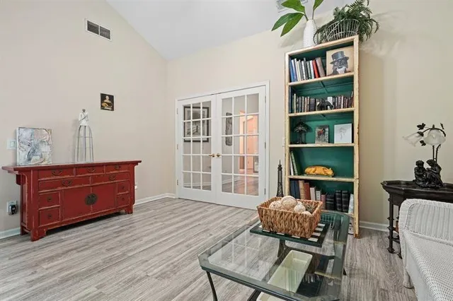 a room with furniture window and wooden floor