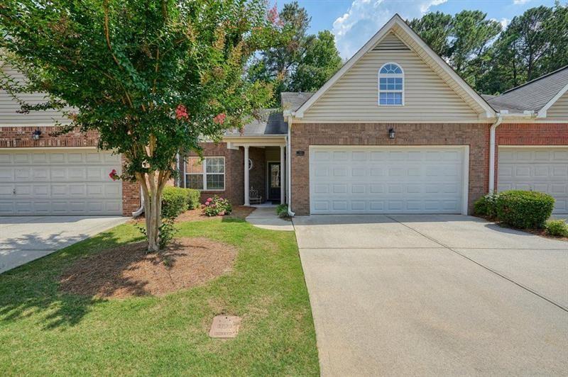 2521 Eden Ridge Lane, Unit 7 Acworth, GA 30101 - Photo 3 of 47 a front view of a house with garden