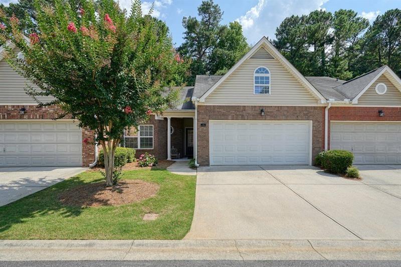 2521 Eden Ridge Lane, Unit 7 Acworth, GA 30101 - Photo 4 of 47 a front view of a house with garden