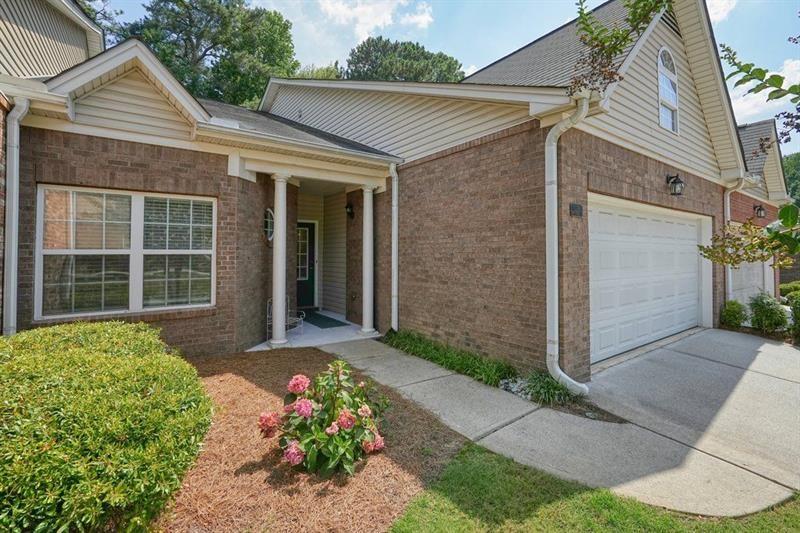 2521 Eden Ridge Lane, Unit 7 Acworth, GA 30101 - Photo 5 of 47 a front view of a house with a garden