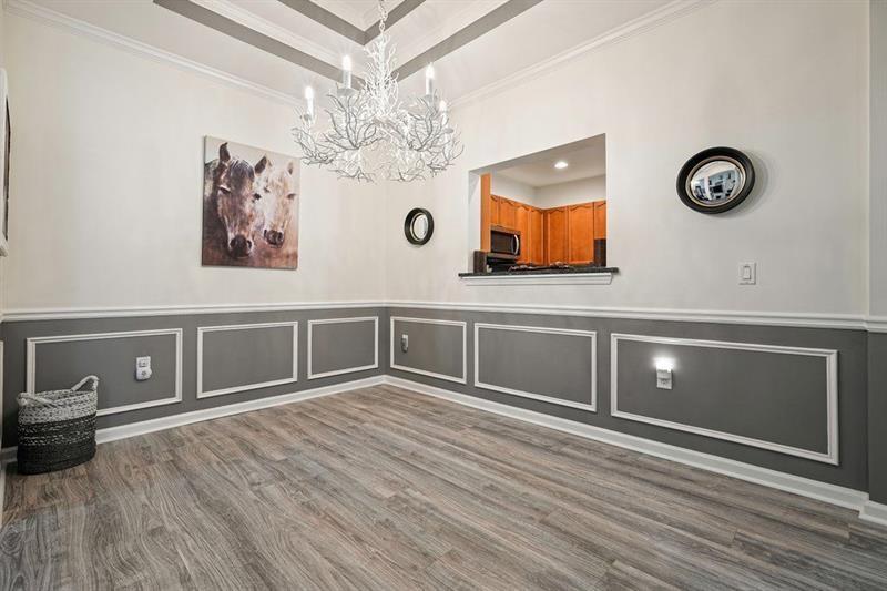 2521 Eden Ridge Lane, Unit 7 Acworth, GA 30101 - Photo 9 of 47 a view of a hallway with wooden floor