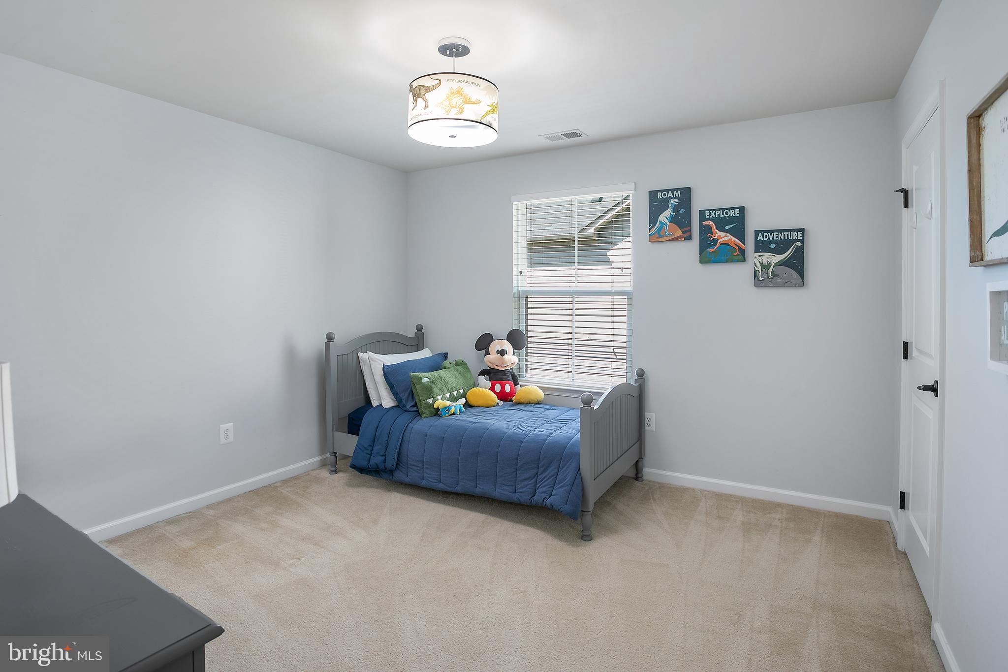 10576 Long Leaf Lane Waldorf, MD 20603 - Photo 28 of 54 a living room with furniture and a window