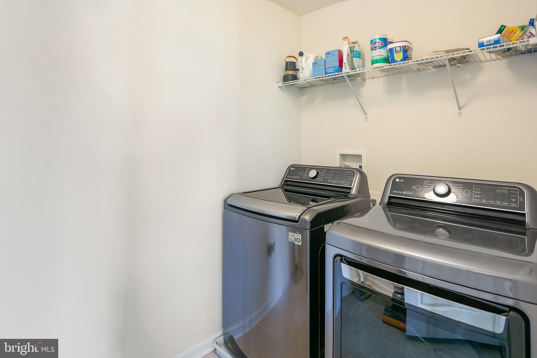 10576 Long Leaf Lane Waldorf, MD 20603 - Photo 32 of 54 a utility room with dryer and washer